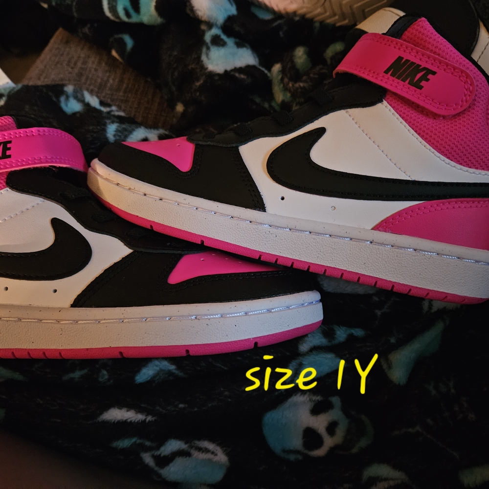 Nike Pink and Black Sneakers High-Top Design